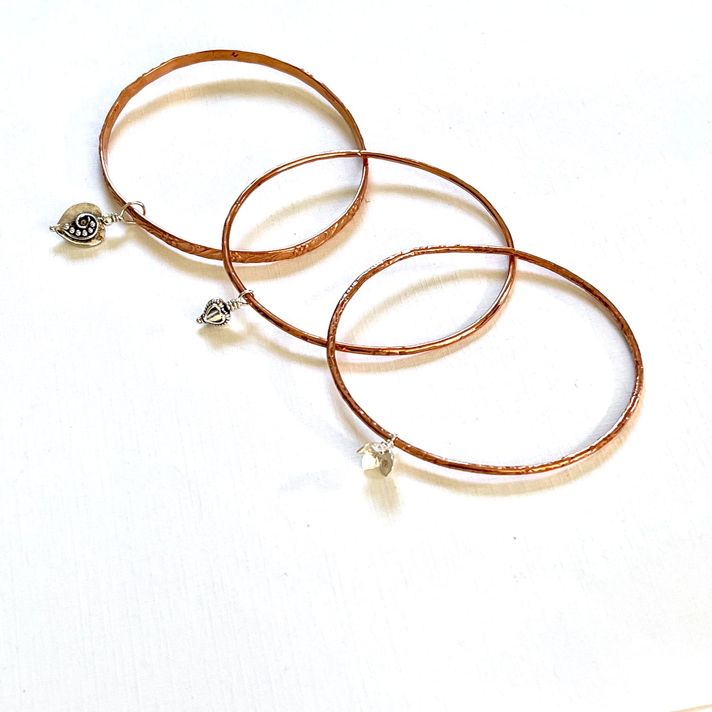 ASSORTED COPPER BANGLES - CIRCLE OF LOVE TALISMAN