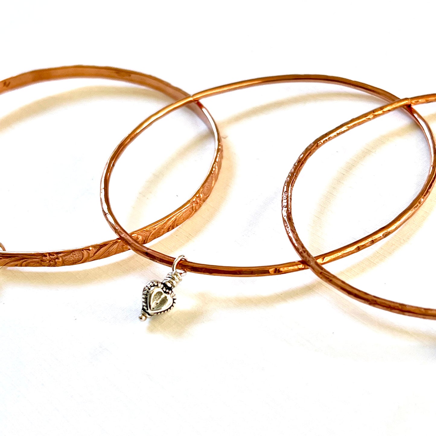 ASSORTED COPPER BANGLES - CIRCLE OF LOVE TALISMAN