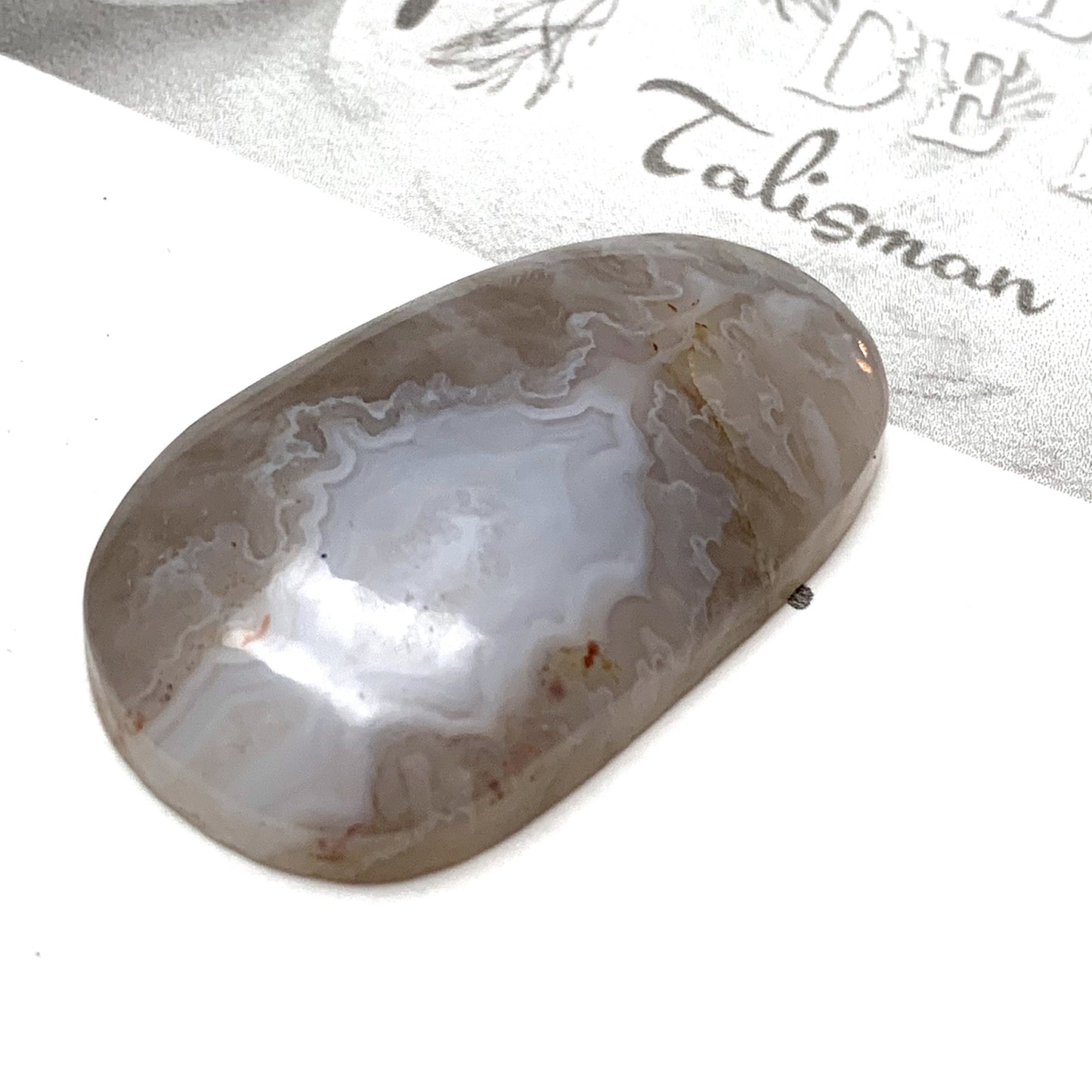 GHOST SEAM AGATE CABOCHON. OVAL. TAUPE. WHITE. 40MM x 24MM x 7MM.