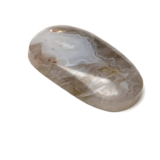 GHOST SEAM AGATE CABOCHON. OVAL. TAUPE. WHITE. 40MM x 24MM x 7MM.