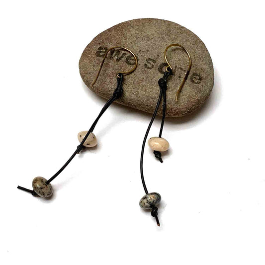 KNOTTED LEATHER TASSEL EARRINGS. PEBBLE GLASS. EARTHY.