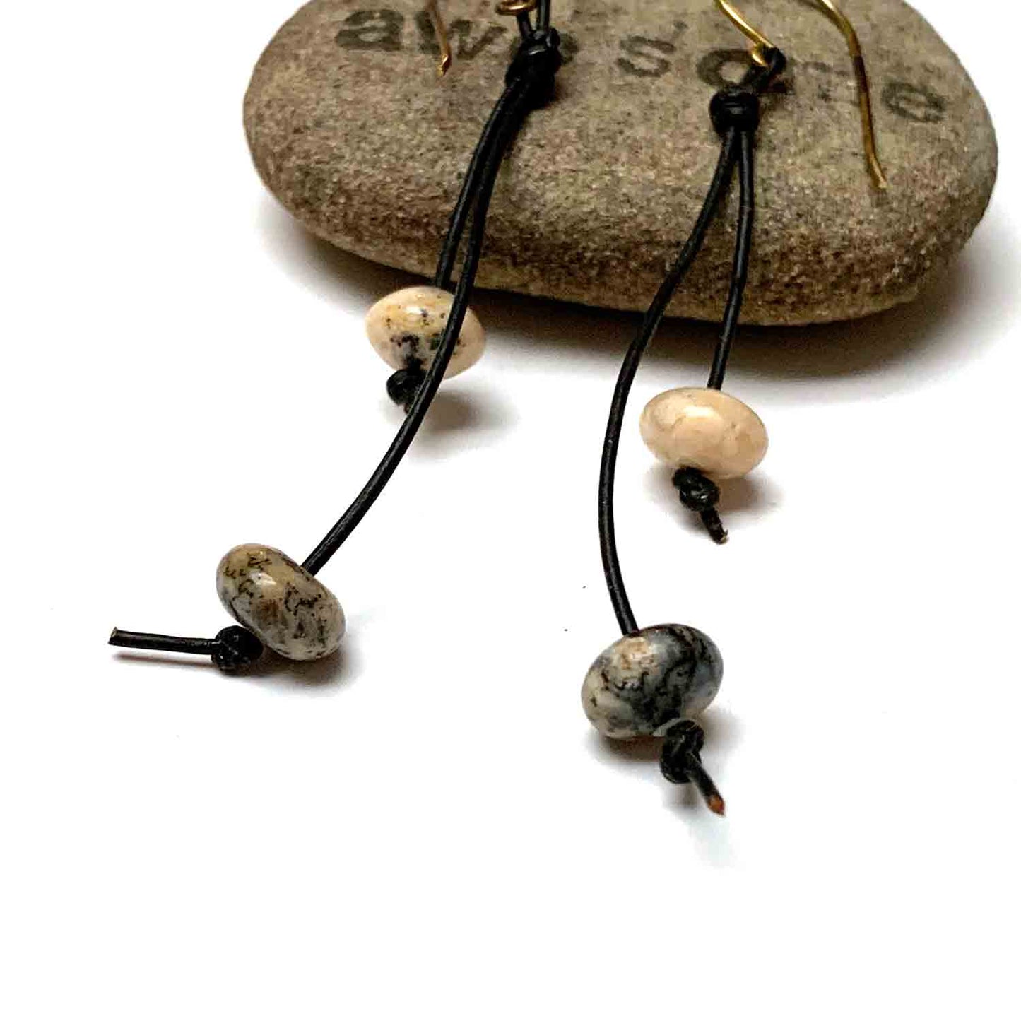 KNOTTED LEATHER TASSEL EARRINGS. PEBBLE GLASS. EARTHY.